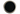 Charcoal powder in glass jar