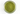 Green tea powder in clear glass jar